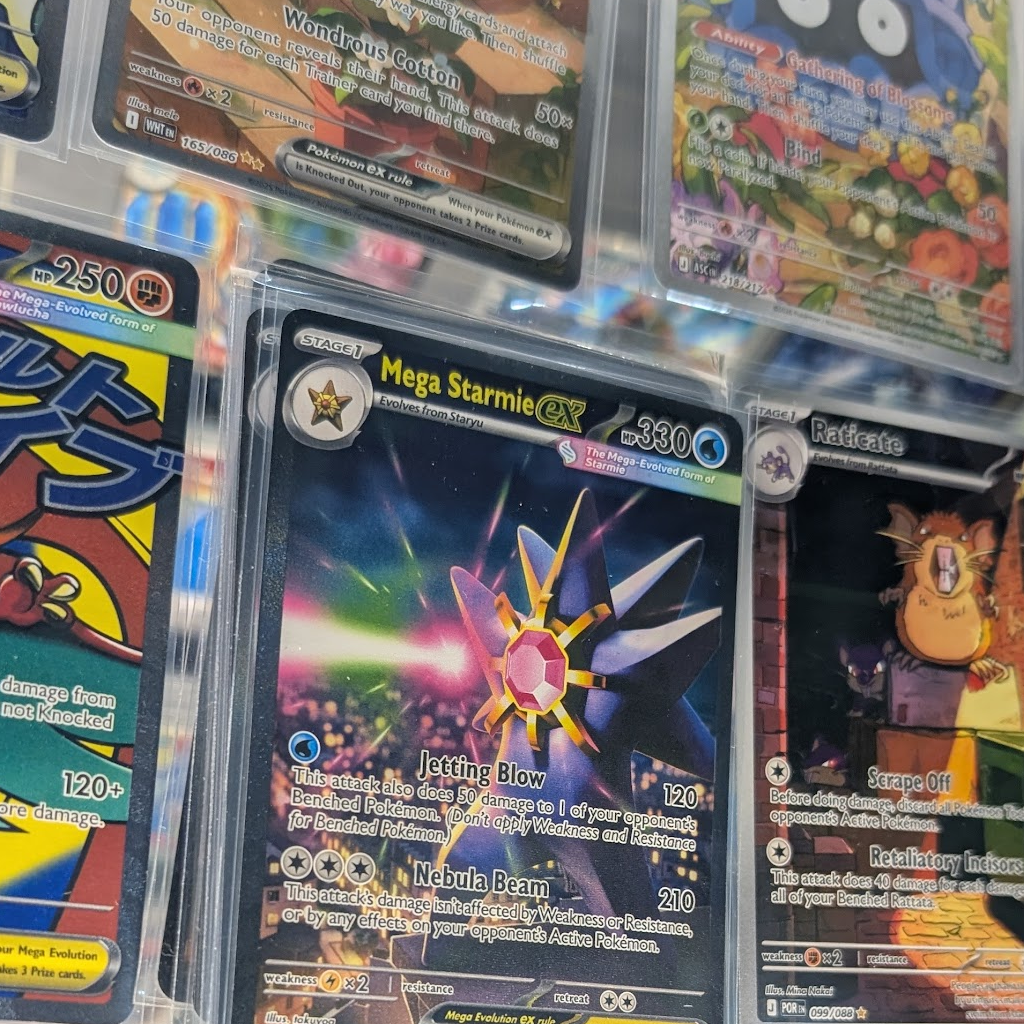 Trading cards displayed in a glass case